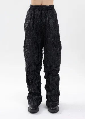 BLACK CRUMPLED OVERSIZED TRACK PANTS